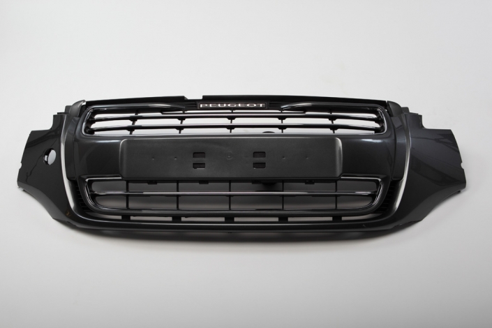 Grille with chrome part